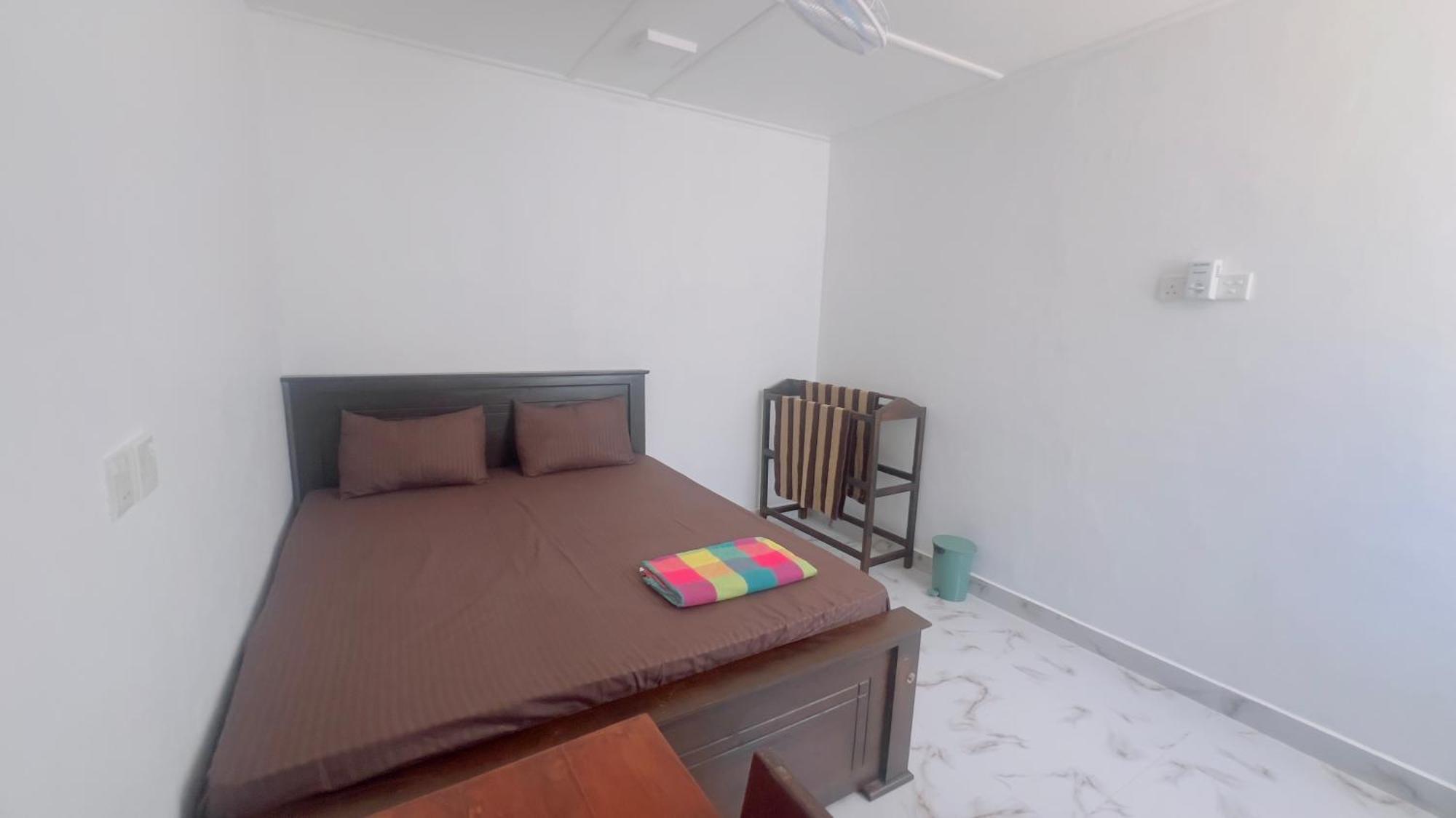 Coconut Leaf Shadow Guest Homestay