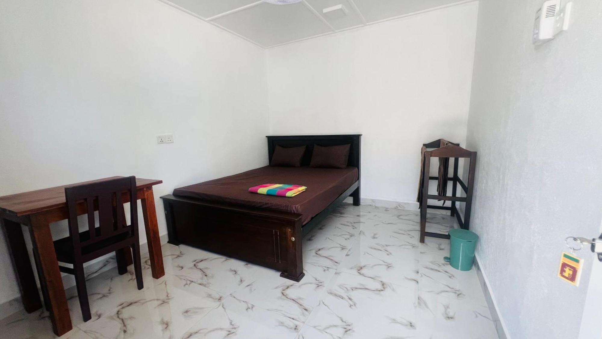 Coconut Leaf Shadow Guest Homestay